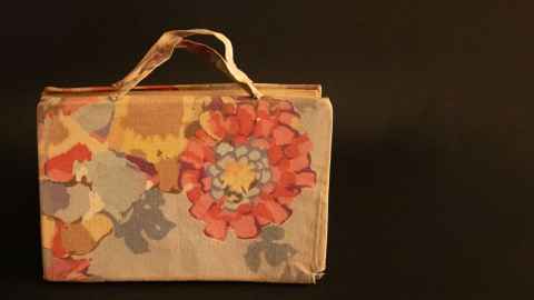 Midwifery textbook with a home-made carry case