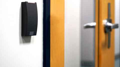 A door opening with a card reader alongside it