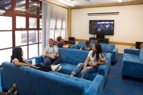 Residents sit in the O'Rorke Hall communal lounge. 