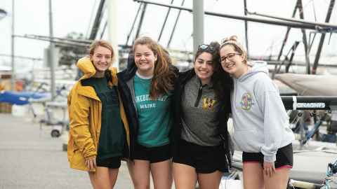 Group of 4 female students at the marine sports centre