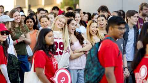Group of students walking down Princes Street in Auckland