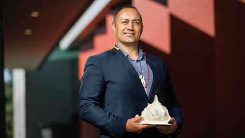 Michael Steedman holding a conch shell