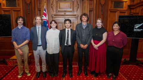 Thomas Phillips and Kyja McCabe pictured with scholarships recipients from other universities