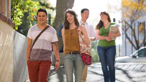 Group of students walking down Symonds St.
