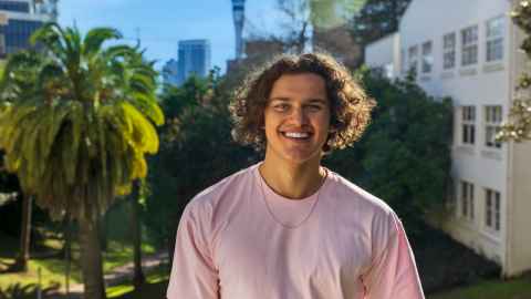 Happy student on campus.