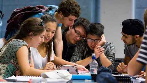 Group of students working together at a table.