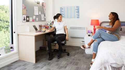 Two students in a room at the Carlaw Park accommodation
