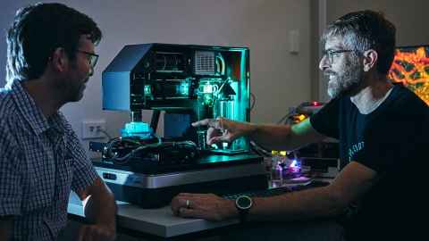 Two students working in the lab.