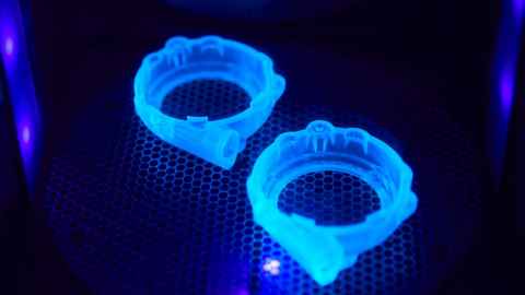 Plastic items in a 3D printer.