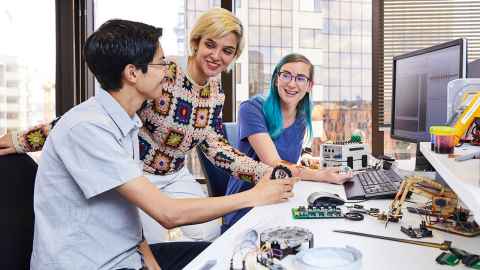 ABI Students around a computer