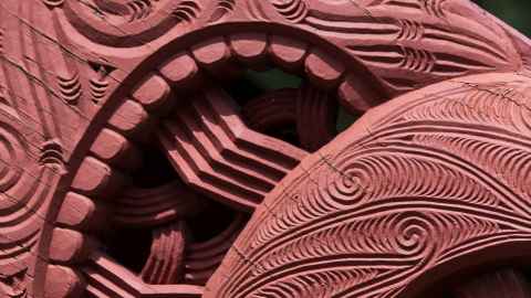 Red Māori carving.