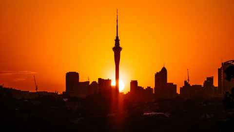 The Auckland skyline at sunset with the Sky Tower centre