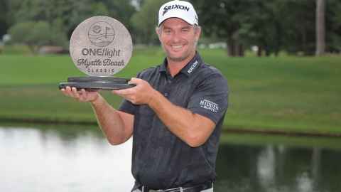 Ryan Fox holding an award