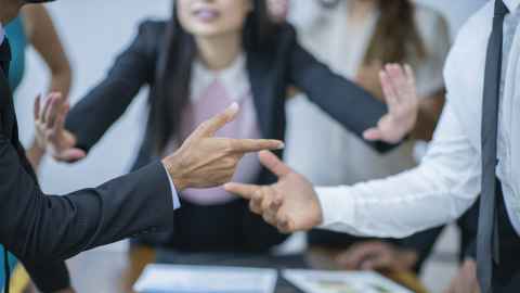 Workplace conflict stock image