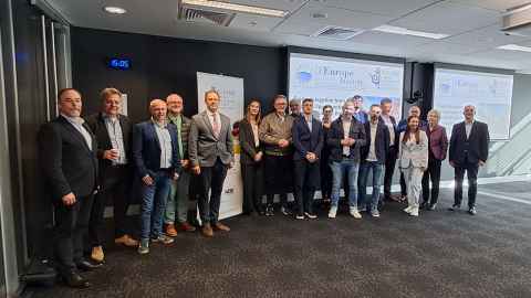 Group photo taken at the Polish event with speakers and attendees