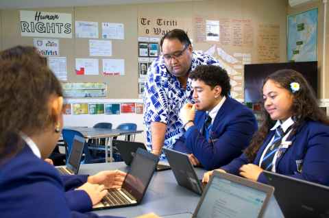 Teacher and Māori and Pasifika children in a classroom