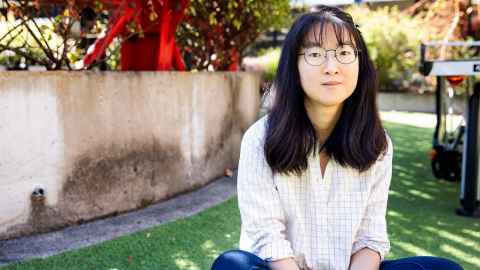 Luna Zhao sitting in the Arts Quad