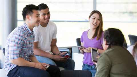 Four students indoors