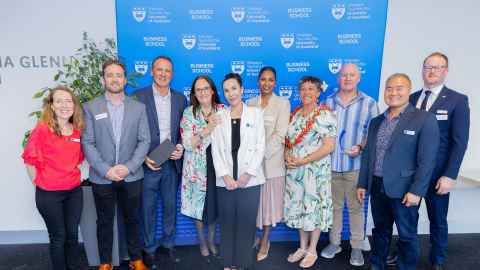 Alumni Relations Manager, Natalie Newton, Interim Dean, Professor Carla Houkamau, and MBA Director Mike Lee, with past and present board members of the Auckland MBA Alumni group, AMBAA. 