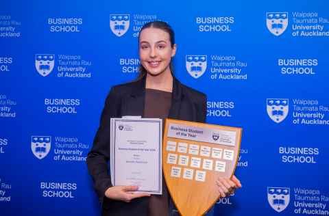 Danielle Ouwehand, Business Student of the Year 2025 winner holding her awards