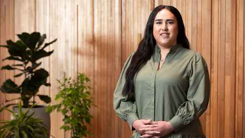 BProp graduate Celeste standing and smiling