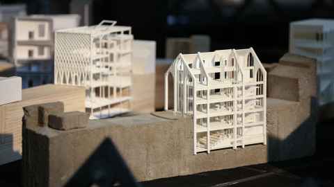 Close up of small architectural models on table
