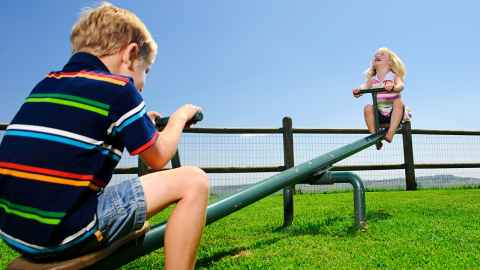 Children on a seesaw