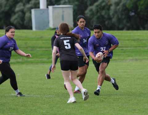 Women playing rugby