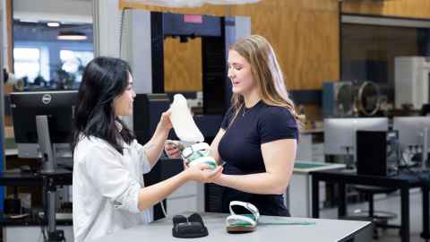Natalia Clarke and Bernice Yeo with 3D-printed orthotic insoles.