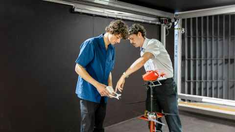 Samuel Gordon and Thomas Phillips working on UAV in Wind Tunnel.