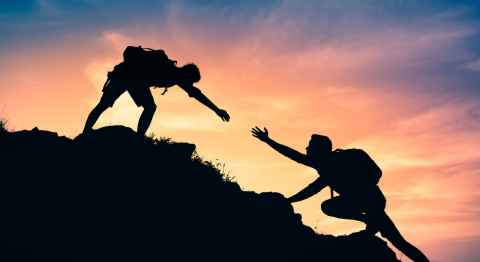 Men reaching out for a hand