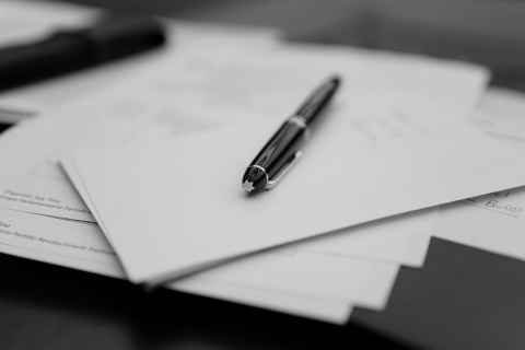 Pen on sheets of paper