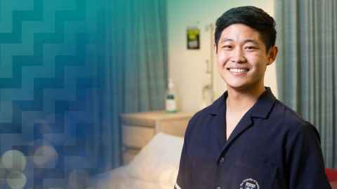 Male nursing student smiling