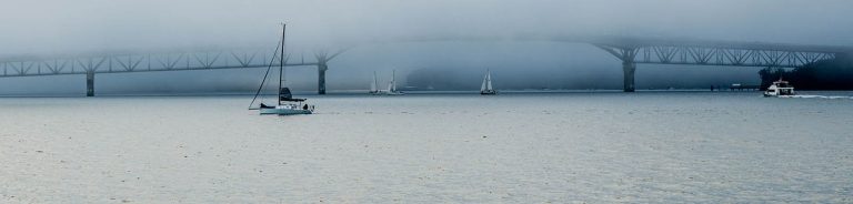 Auckland Harbour looking towards the bridge on a grey morning