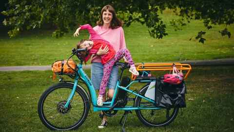 Staff member Charlotte Blythe with her bike.