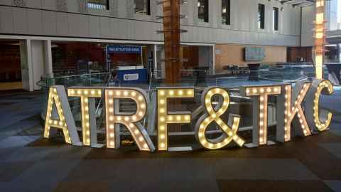 Life-size letter shaped lights that spell 'ATRF & TKC'