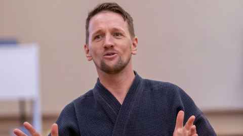 Photo of Dr Blake Bennett speaking