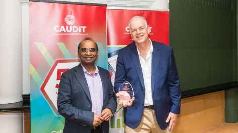 Mark Gregory accepting Caudit award