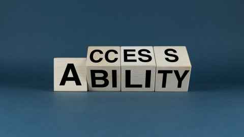 Photo of tiles with the word 'accessibility.' 