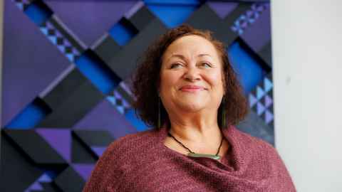 Abigail McClutchie, Kaiārahi, Te Tumu Herenga, Libraries and Learning Services against a purple background