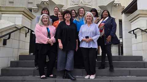 A group of women outside the Clock Tower