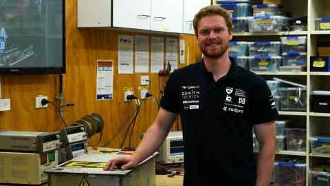Photo of Macgregor Jones in his team's workshop space. 