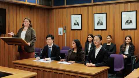 Law students arguing a case