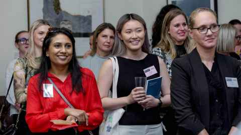 A group of smiling women.