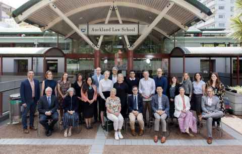 The Auckland Law School academic staff in front of the faculty building