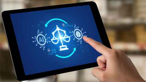 Image of finger on a tablet with AI icons