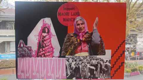 Poster with red and black background and words support Māori land march with cut-out figures