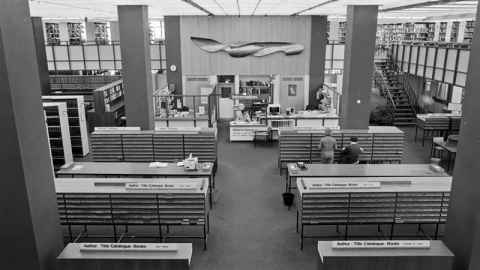 A black and white historical image of the inside of the general library