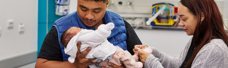 Hands on pregnant belly.