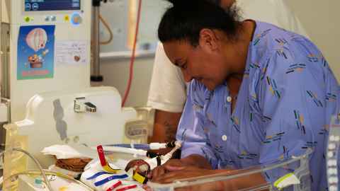Mother and pre-term baby in the NICU